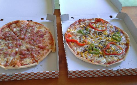 Pizza da asporto: il cartone potrebbe essere velenoso. Indaga il Ministero